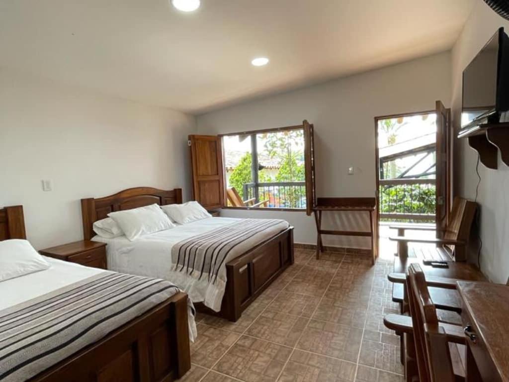 Hotel Bosques Del Saman Alcala Кимбая Екстериор снимка
